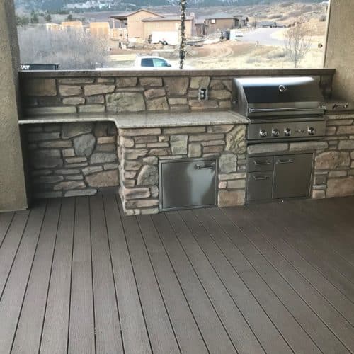 custom outdoor kitchen with stone