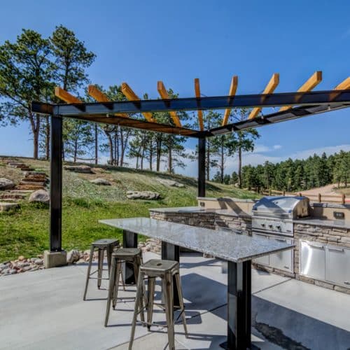 Monument, outdoor kitchen, DCS built-in grill, steel pergola