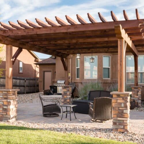 Pergola with lights and stone columns, Colorado Springs